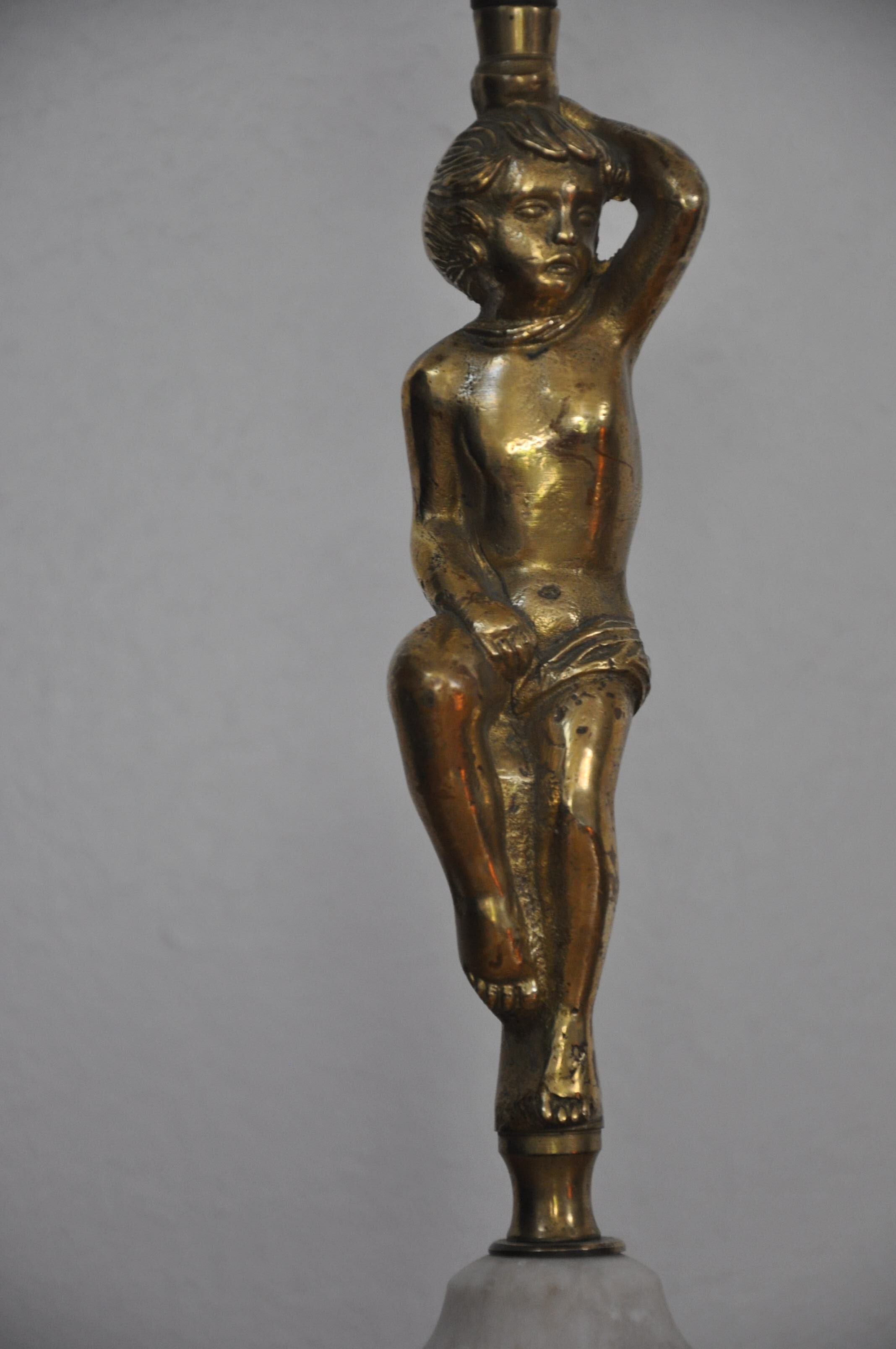 Ancient alabaster lamp and bronze cherub decoration