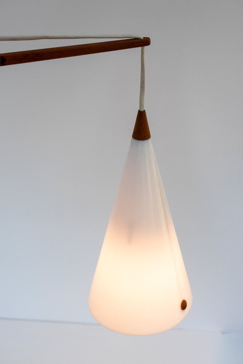 Mid-century Swedish wall lamp in teak by Uno and Östen Kristiansson for Luxus, 1960s