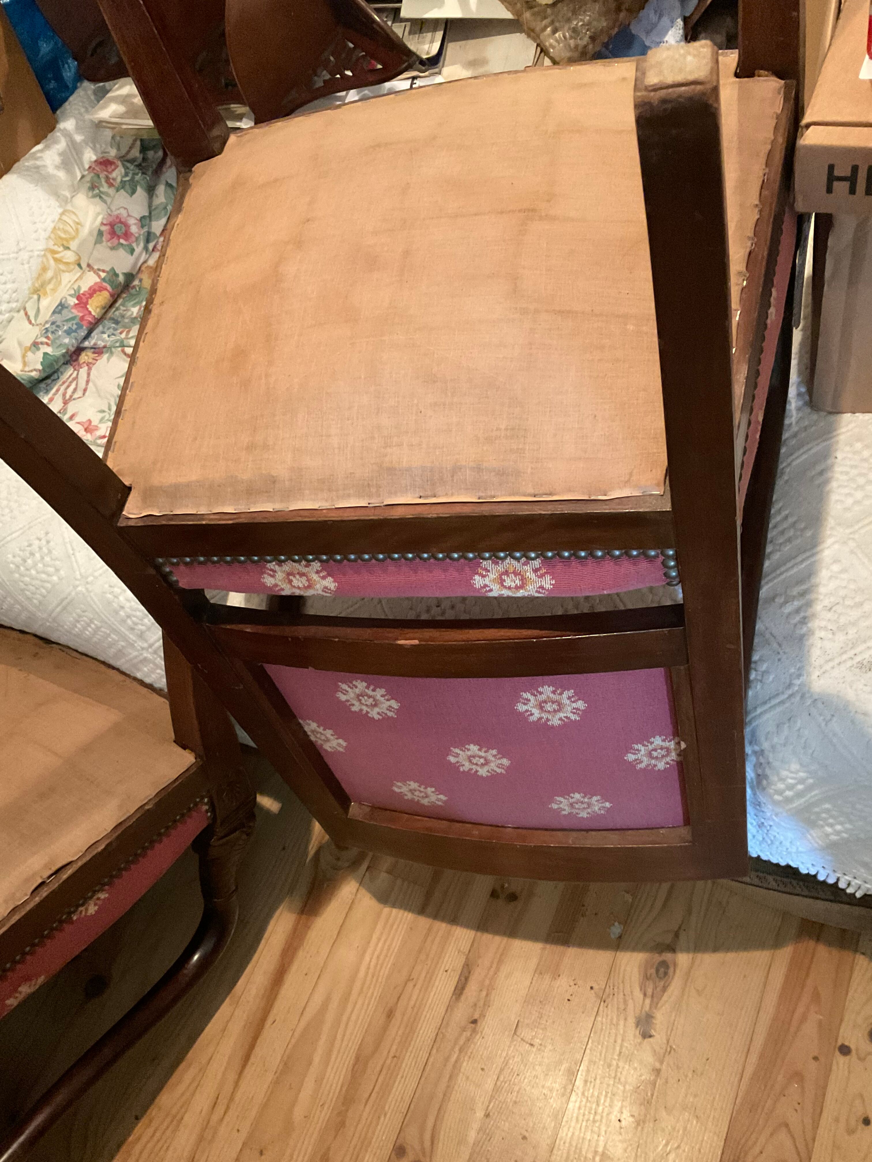 Pair of empire-style armchairs with dolphins