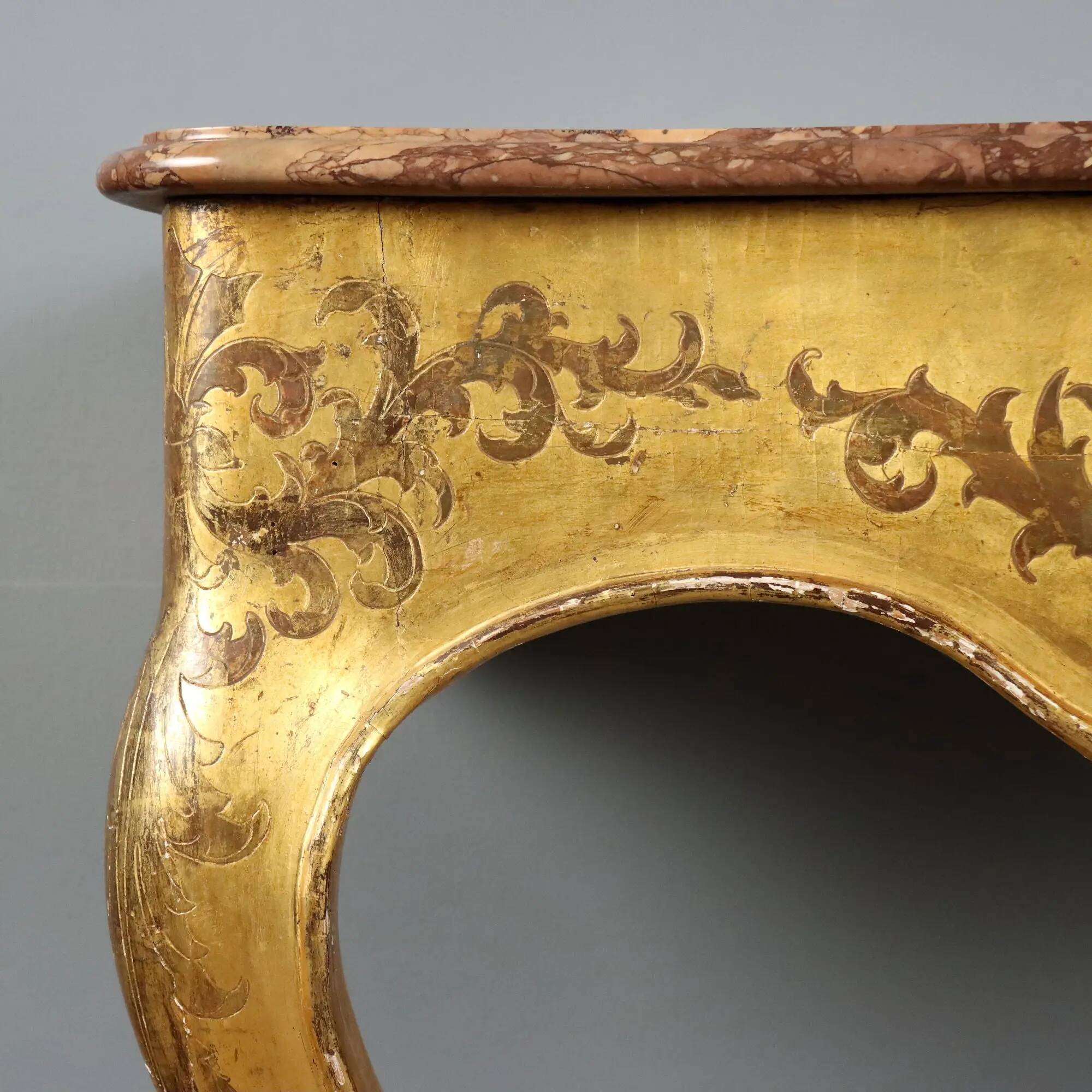 Antique gilded wooden console with marble top, Italy, 19th century.
