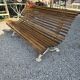 Garden bench with cast iron legs and oak slats