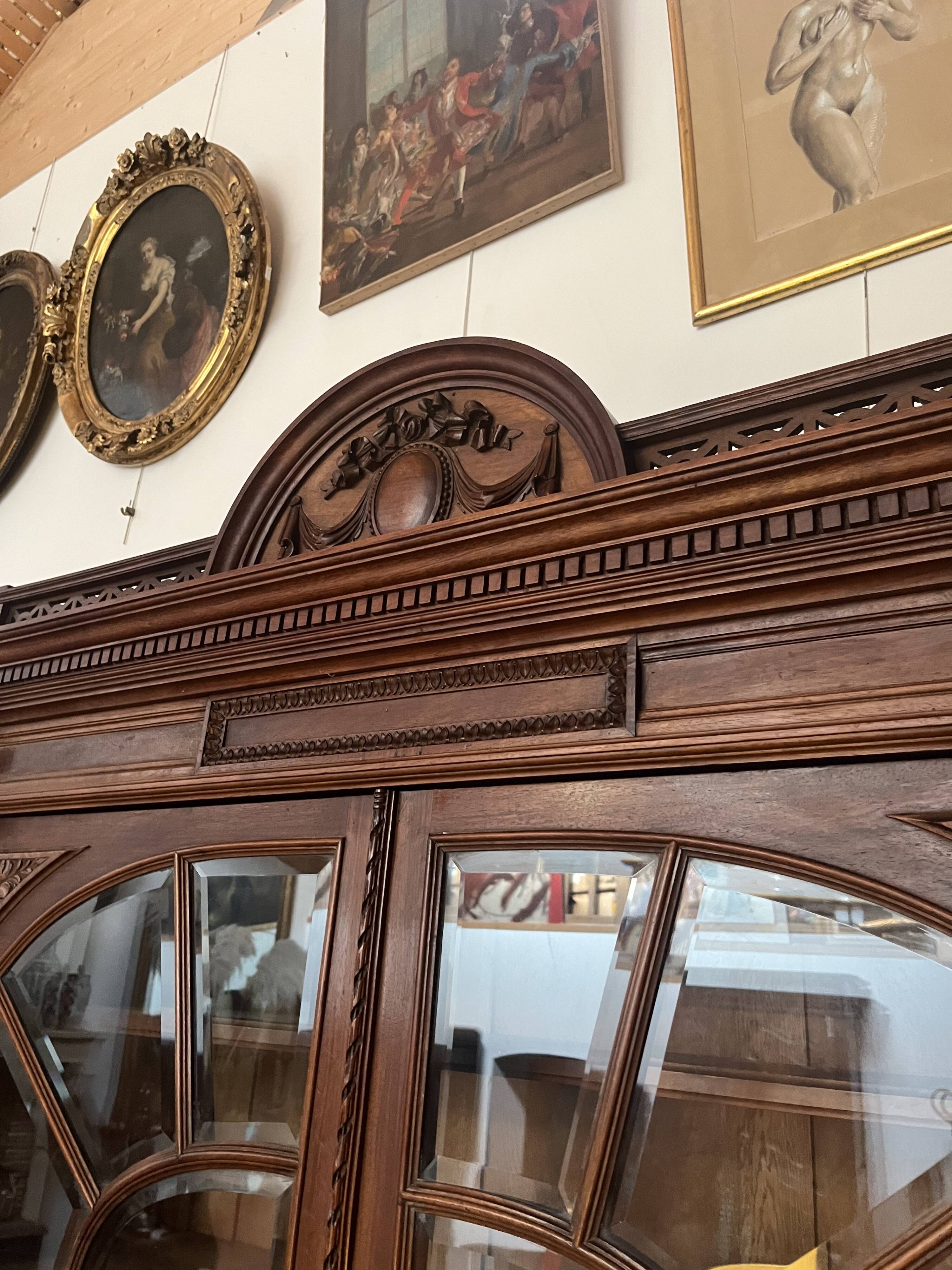 Louis XVI style beveled glass bookcase