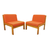 Set of 2 vintage Baumann armchairs in orange fabric and wood from the 80s