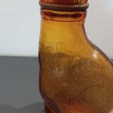 Flacon ancien en verre ambré"chat"