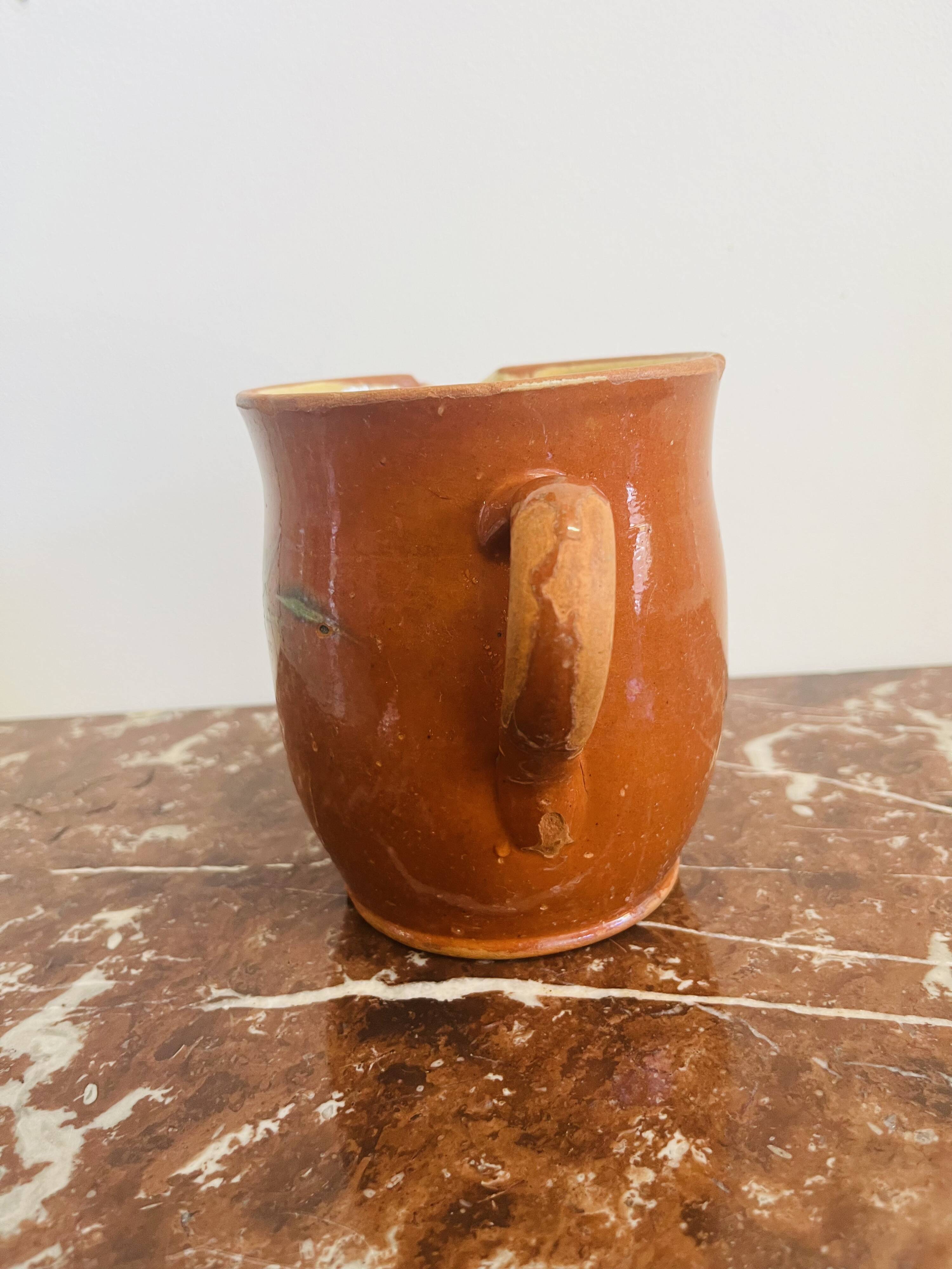 Ancienne poterie pichet savoyard à décor floral