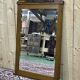Art deco period beveled mirror in oak