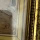 Framed antique engraving under glass