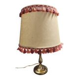Desk lamp with brass base and lampshade with trimmings