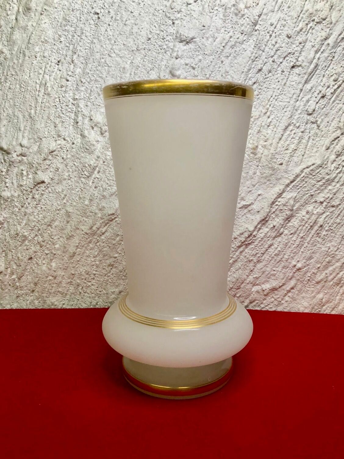 Old white and gold opaline vase