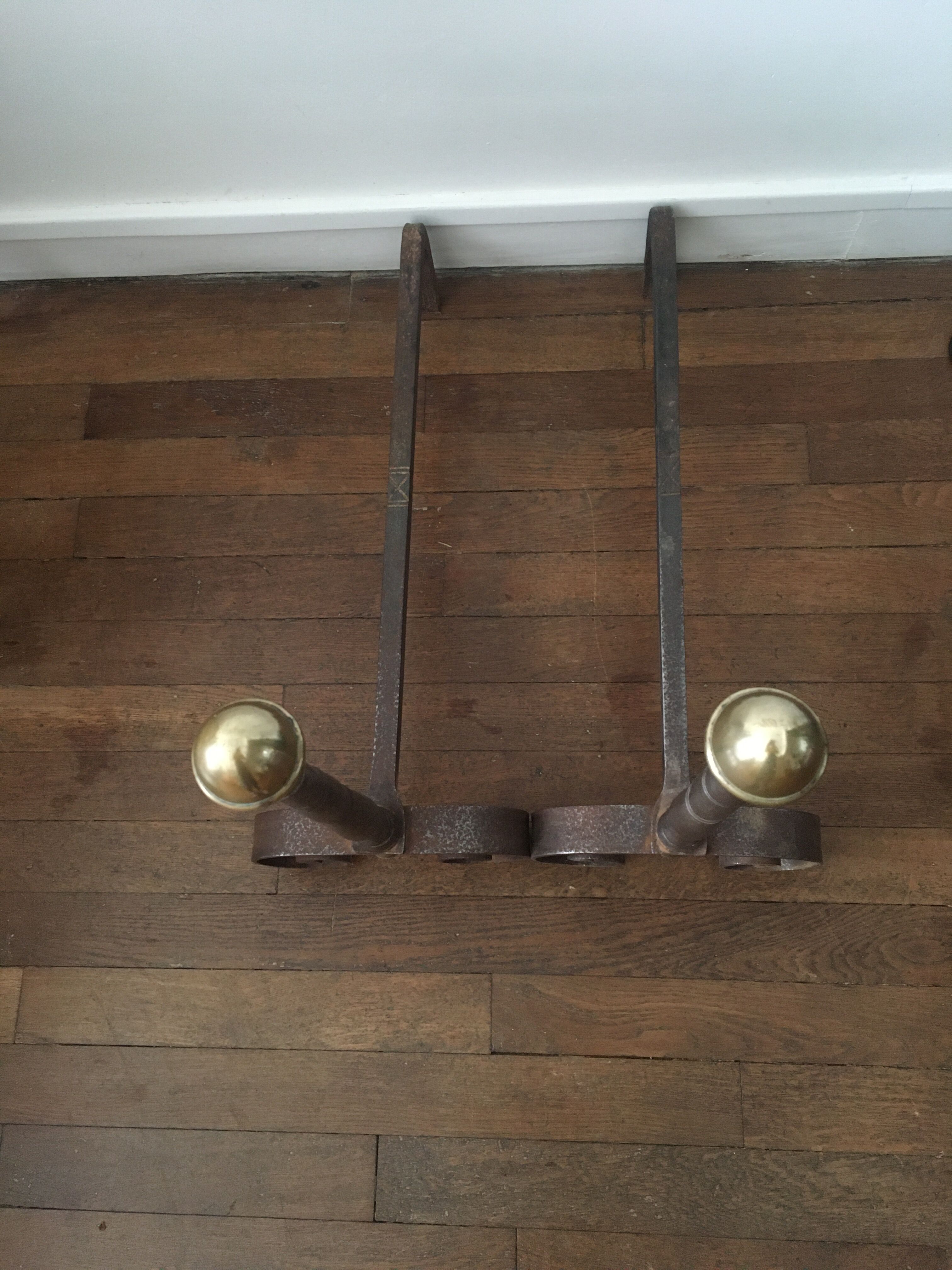 Paire de chenets ancien en fonte et laiton