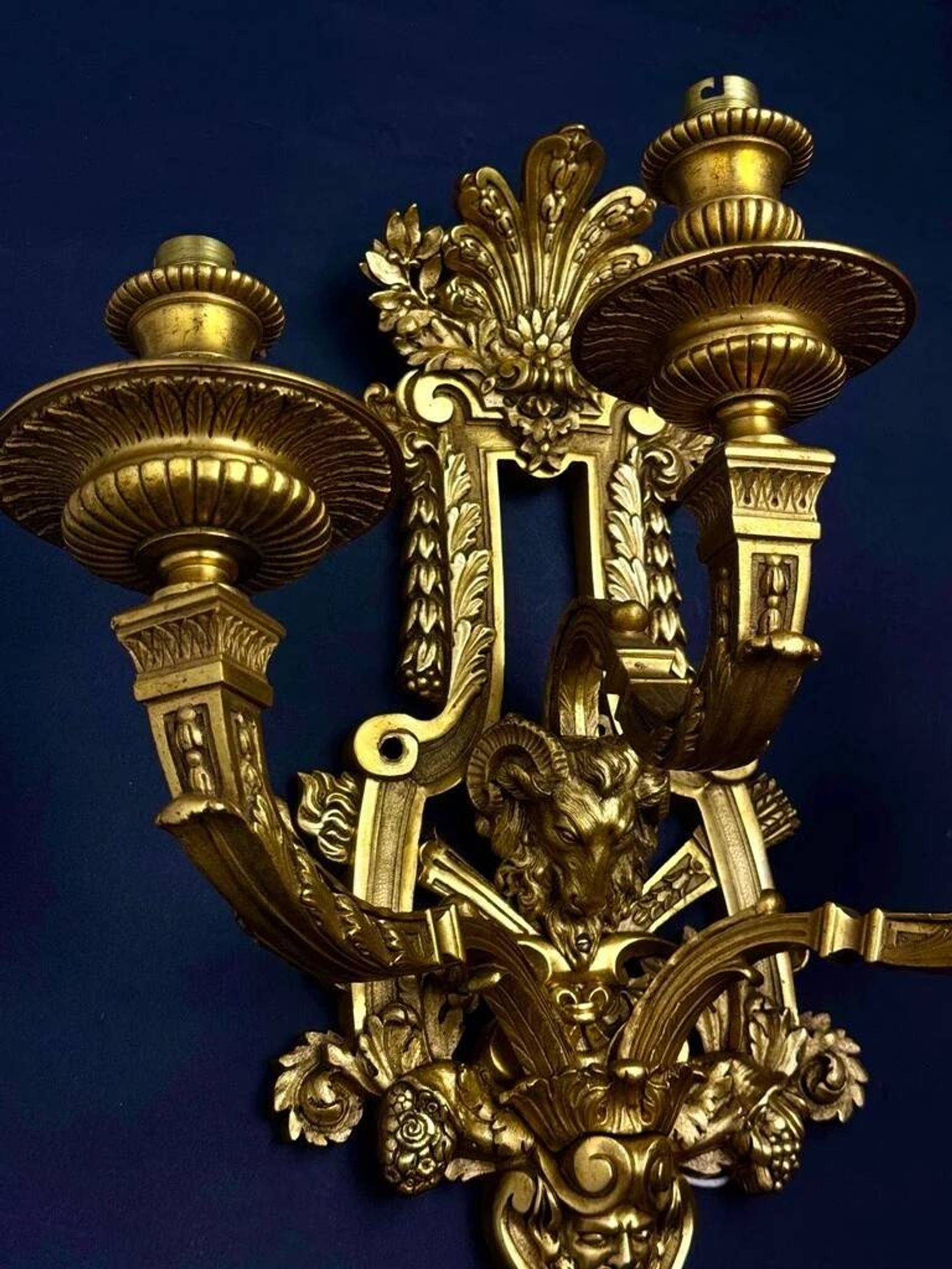 A pair of important gilt bronze wall sconces, Louis XVI style, 19th century.