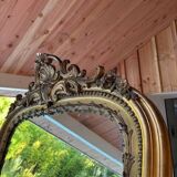 Large 19th century mirror gilded with gold leaf