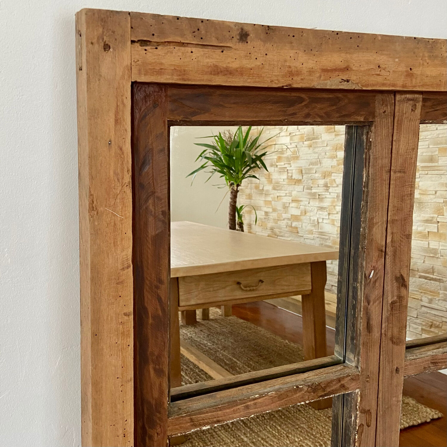 Mirror in old rustic window
