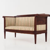 Antique empire style sofa.