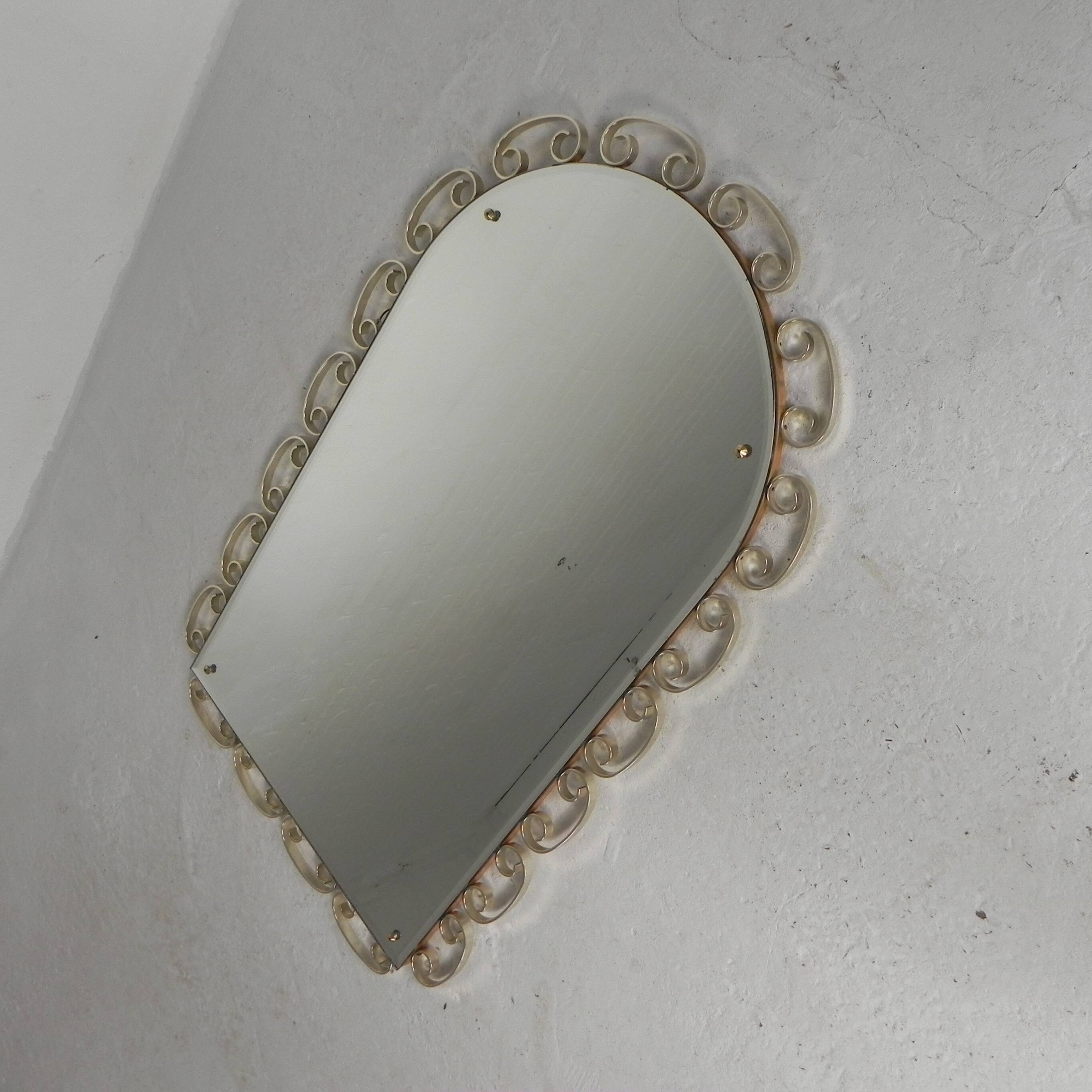 Vintage faceted mirror in an aluminium frame from the 1950s.