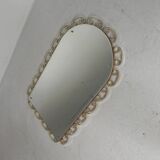 Vintage faceted mirror in an aluminium frame from the 1950s.