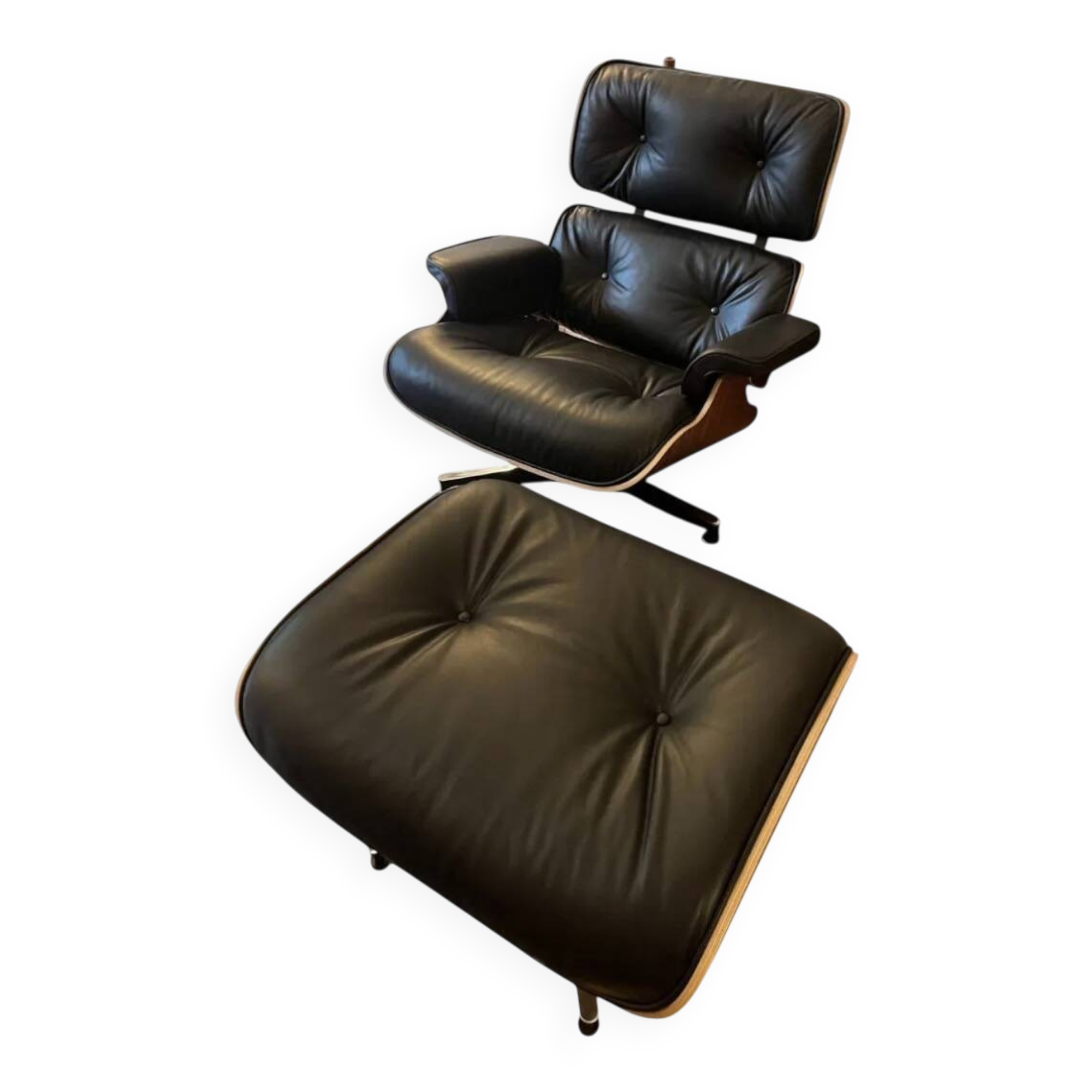 Lounge chair and ottoman by Charles Eames