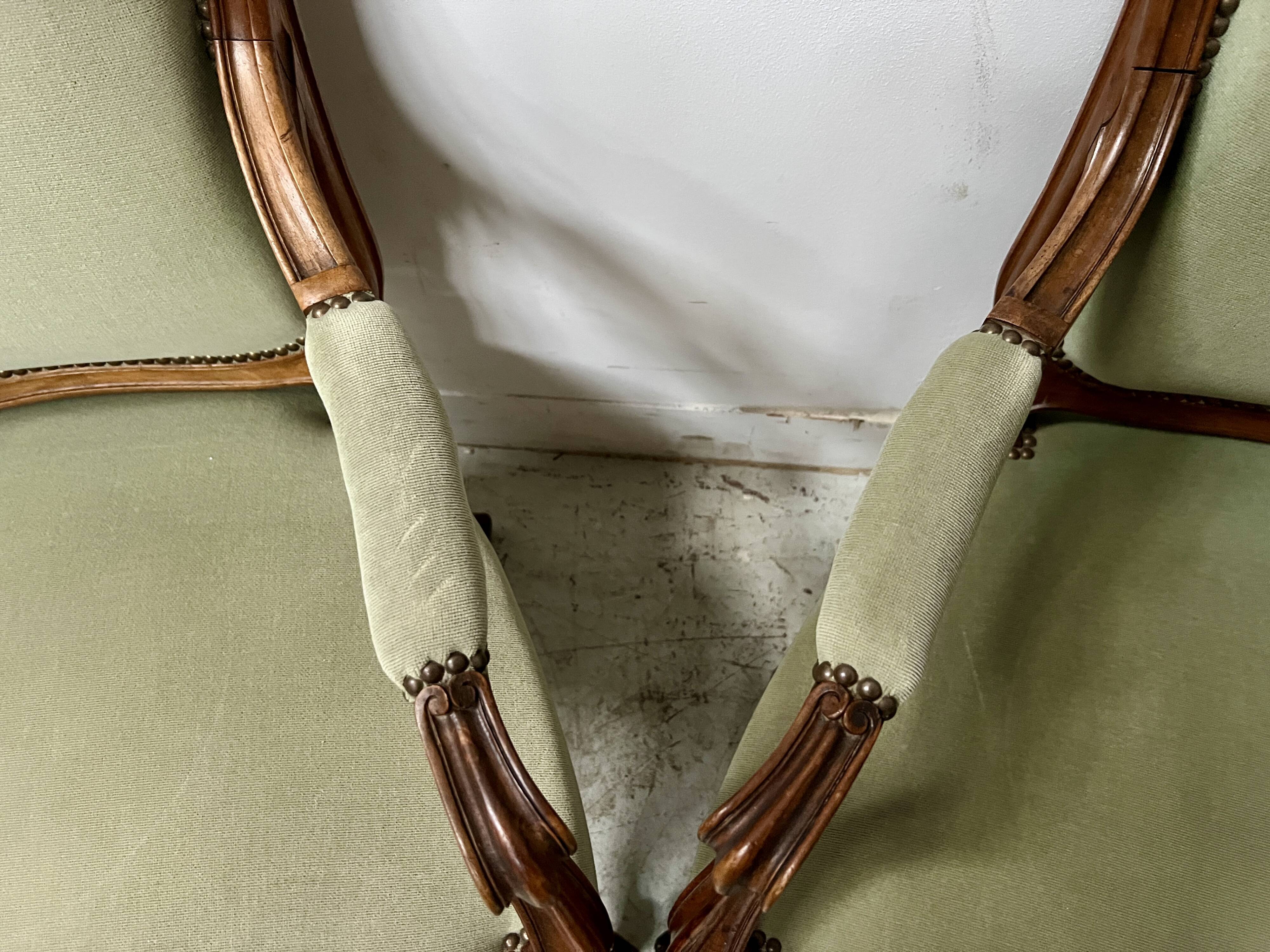 Pair of Louis XV style armchairs in solid walnut, 20th century.