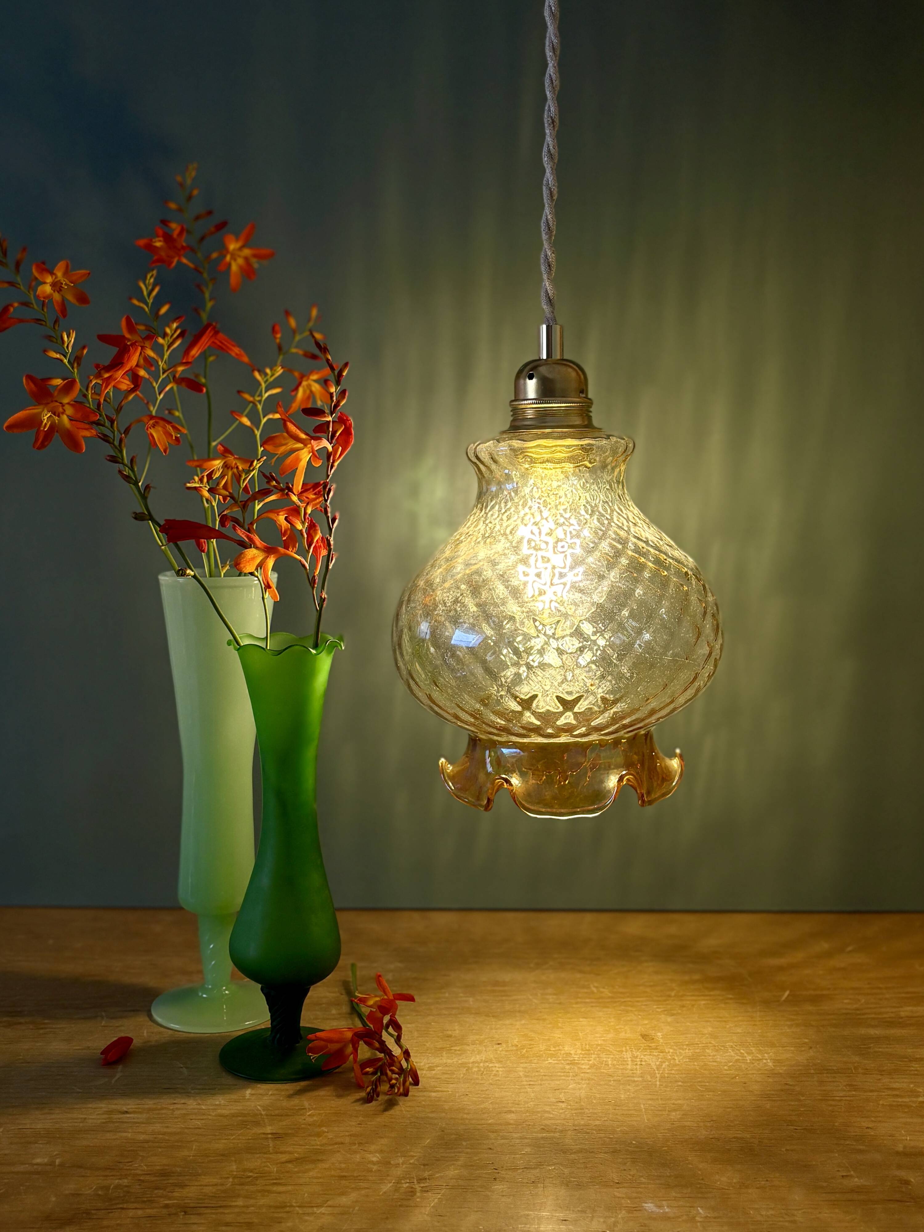 Vintage amber glass suspension globe
