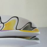 Three vintage free-form ceramic ravine dishes from the 1950s