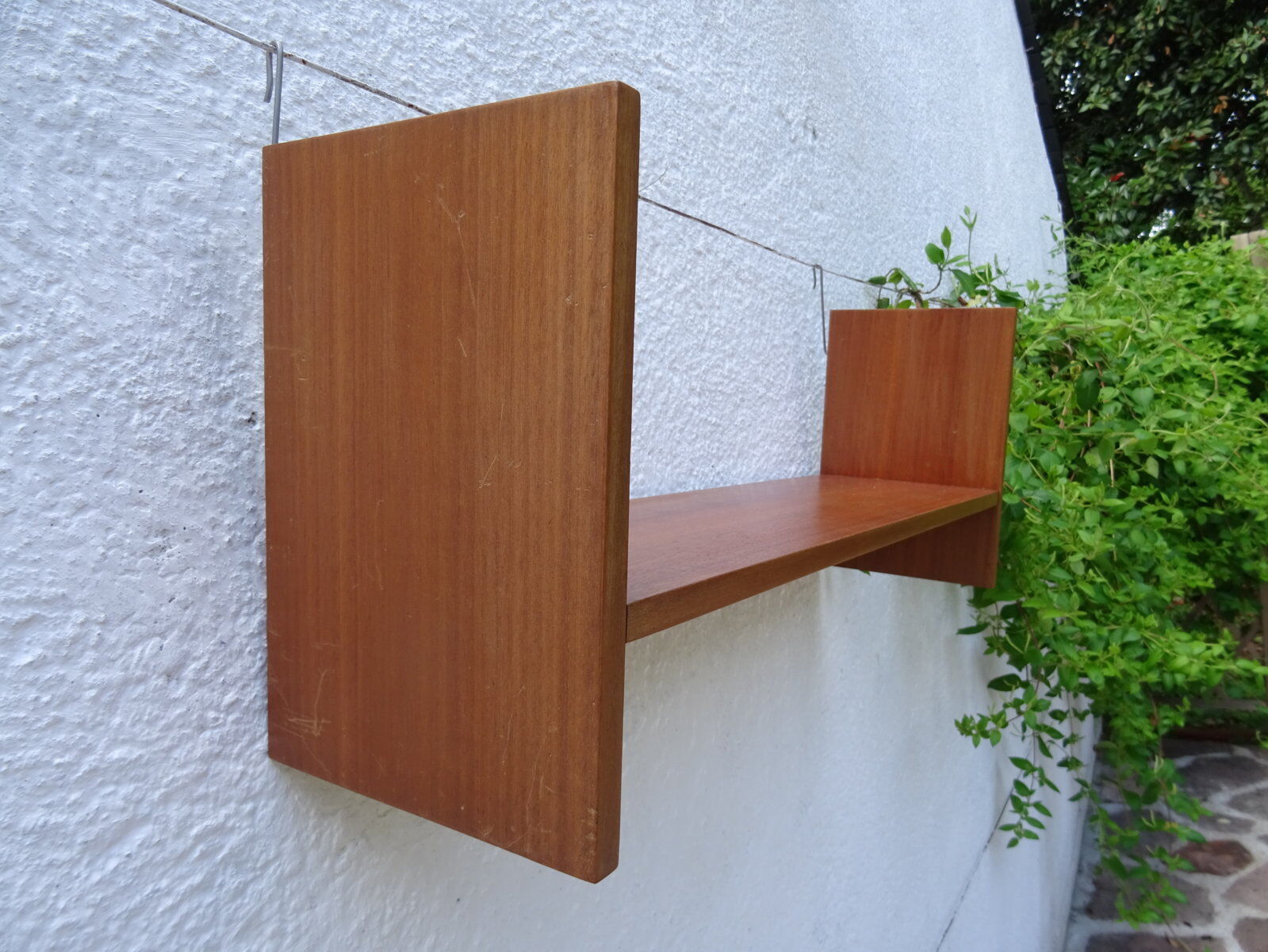 Pair of teak wall shelves