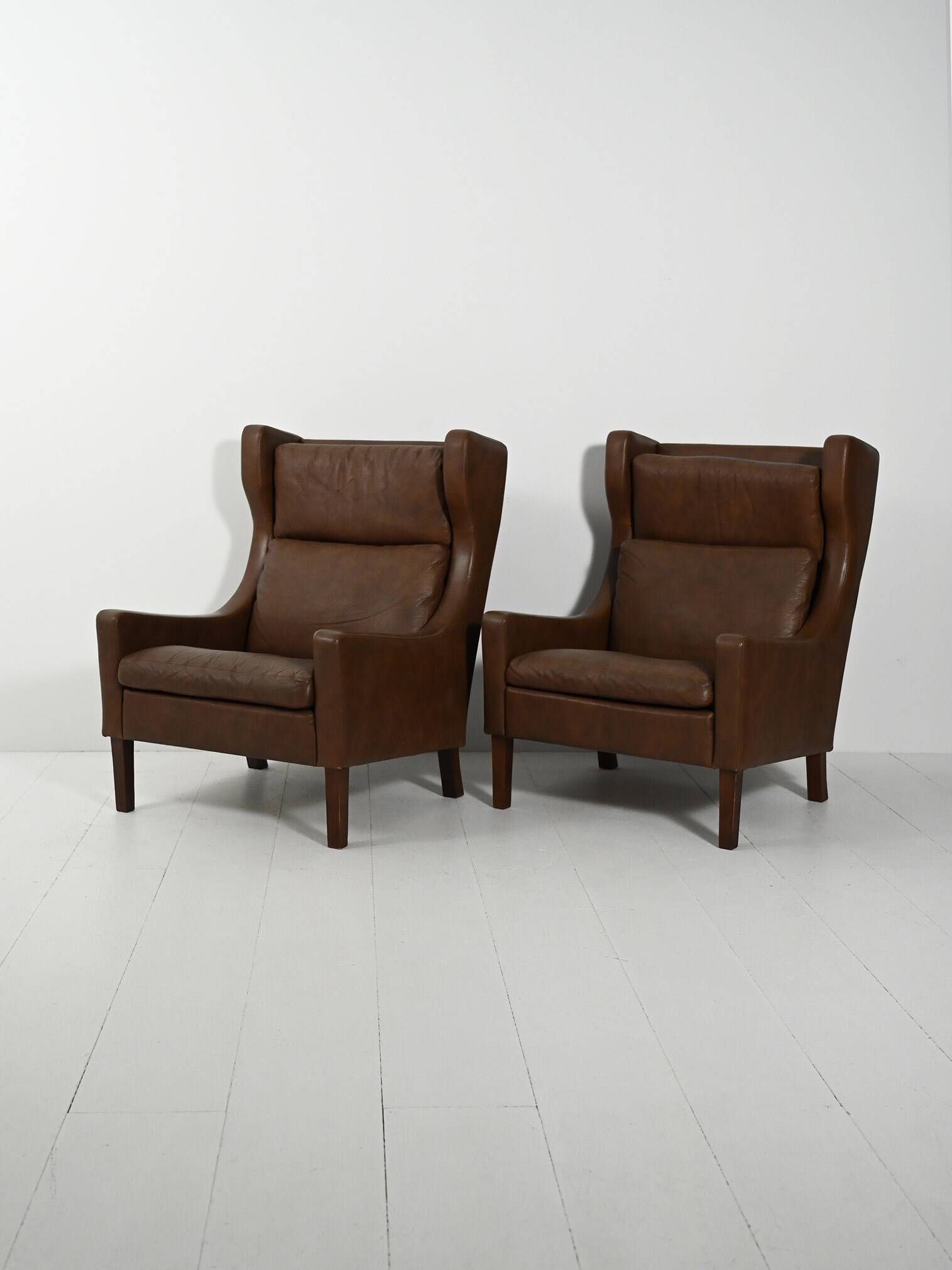 Paire de fauteuils danois vintage en cuir marron