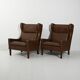 Paire de fauteuils danois vintage en cuir marron