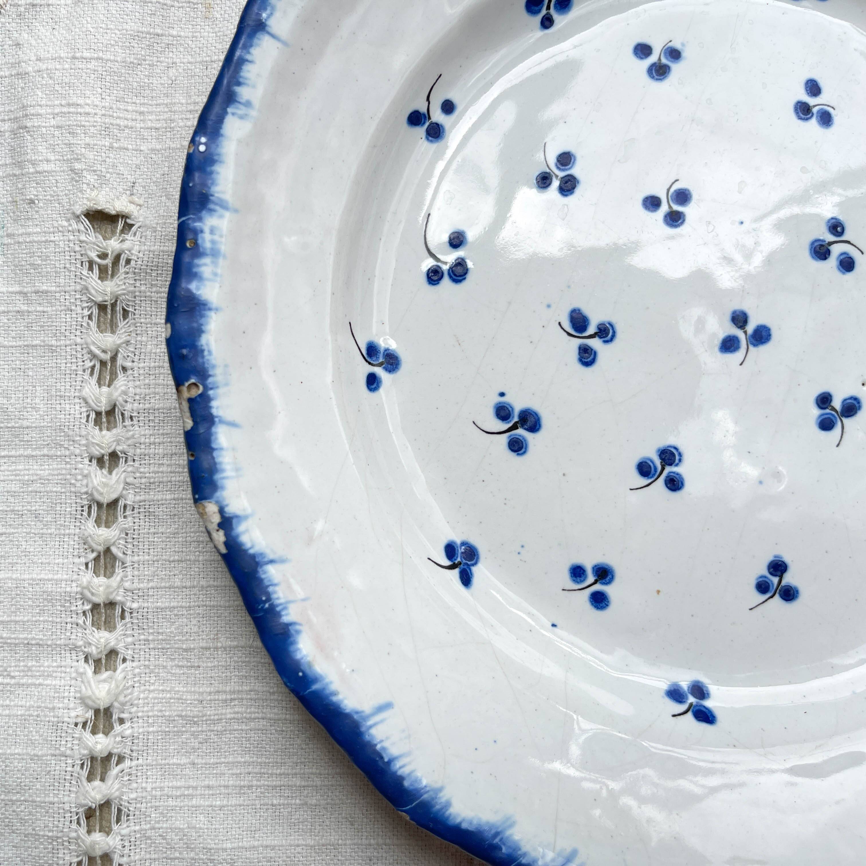 Antique French Earthenware Plate from the 19th century with small blue flower motif