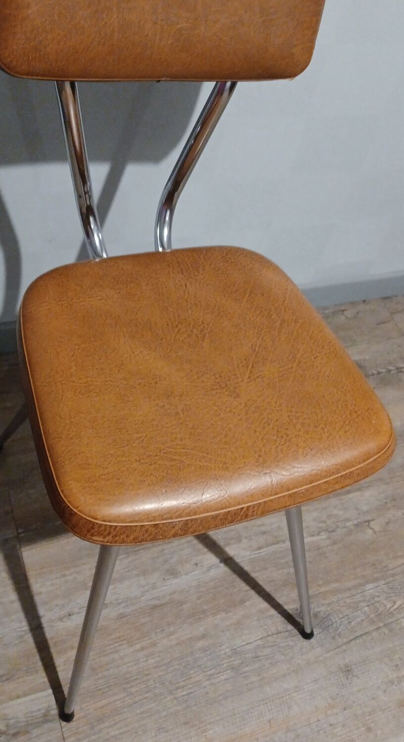 Pair of vintage faux leather and chrome chairs