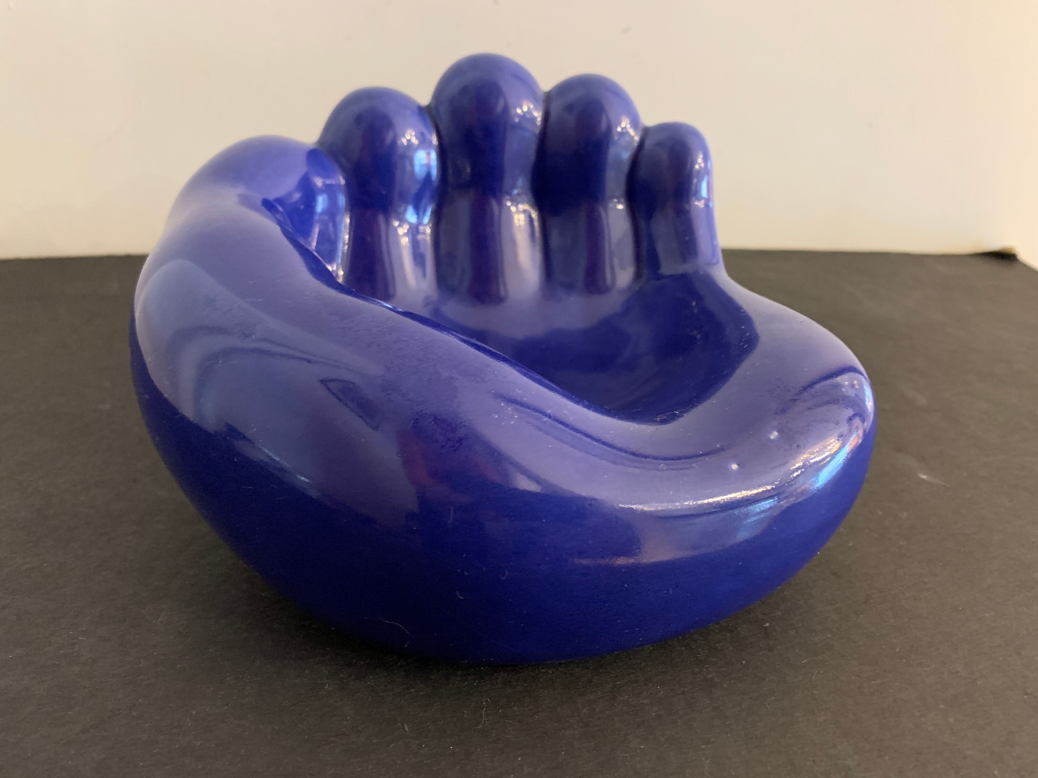 Ceramic ashtray, blue hand shape