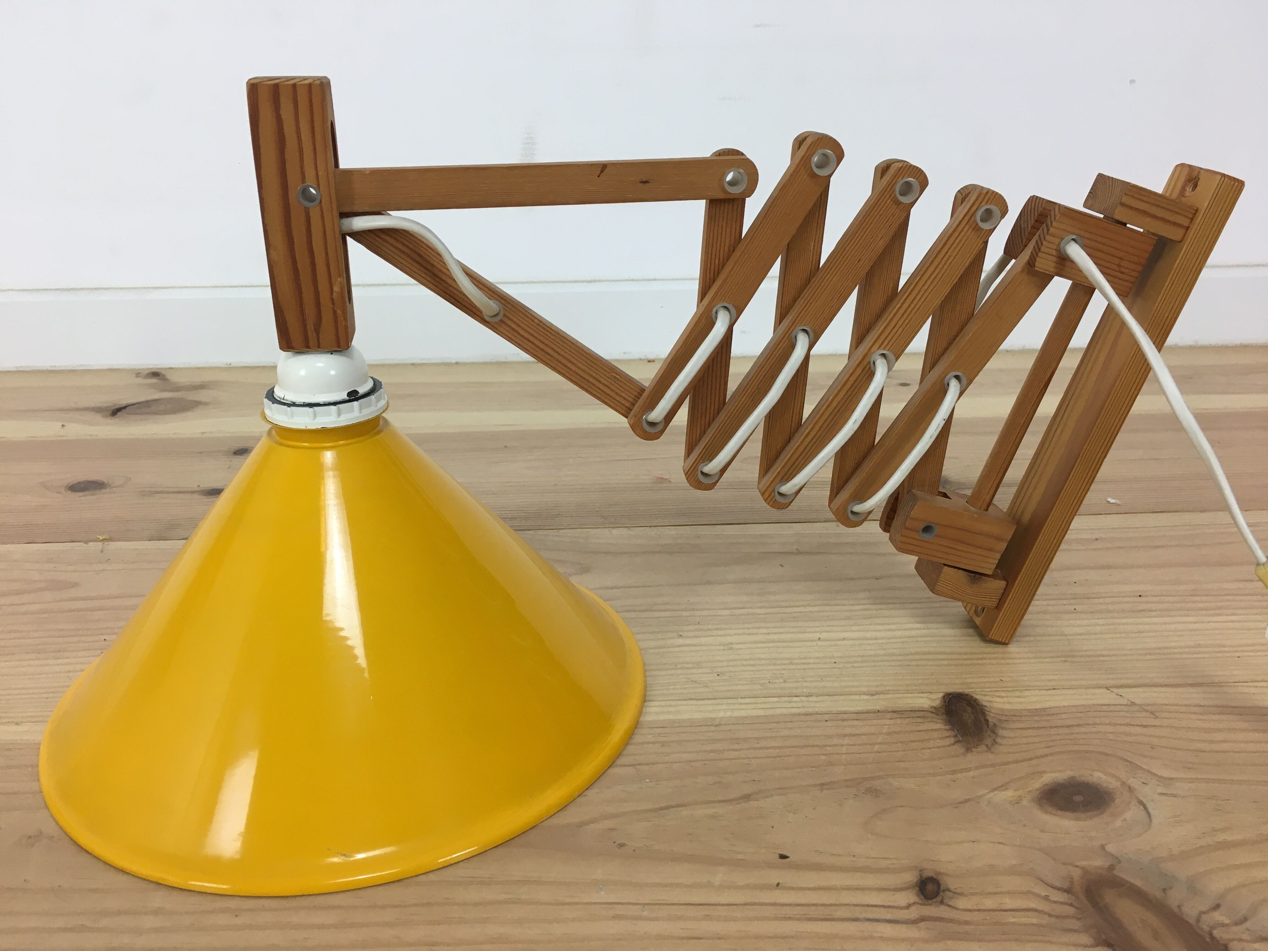 60s accordion sconce, pine, yellow metal reflector