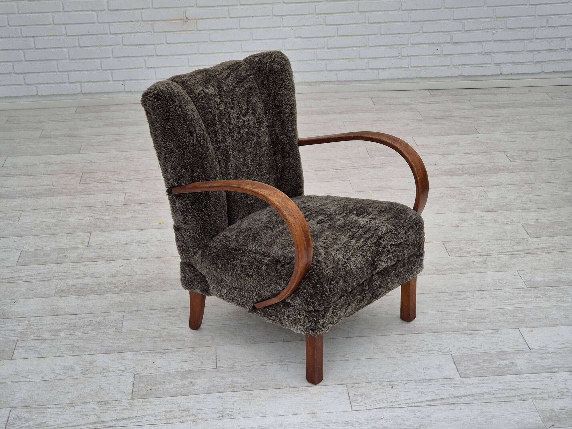1950s, Danish design, reupholstered armchair, genuine sheepskin "Wellington".
