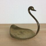 Empty golden brass swan pocket