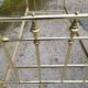 Vintage single bed and nightstand in gilded brass