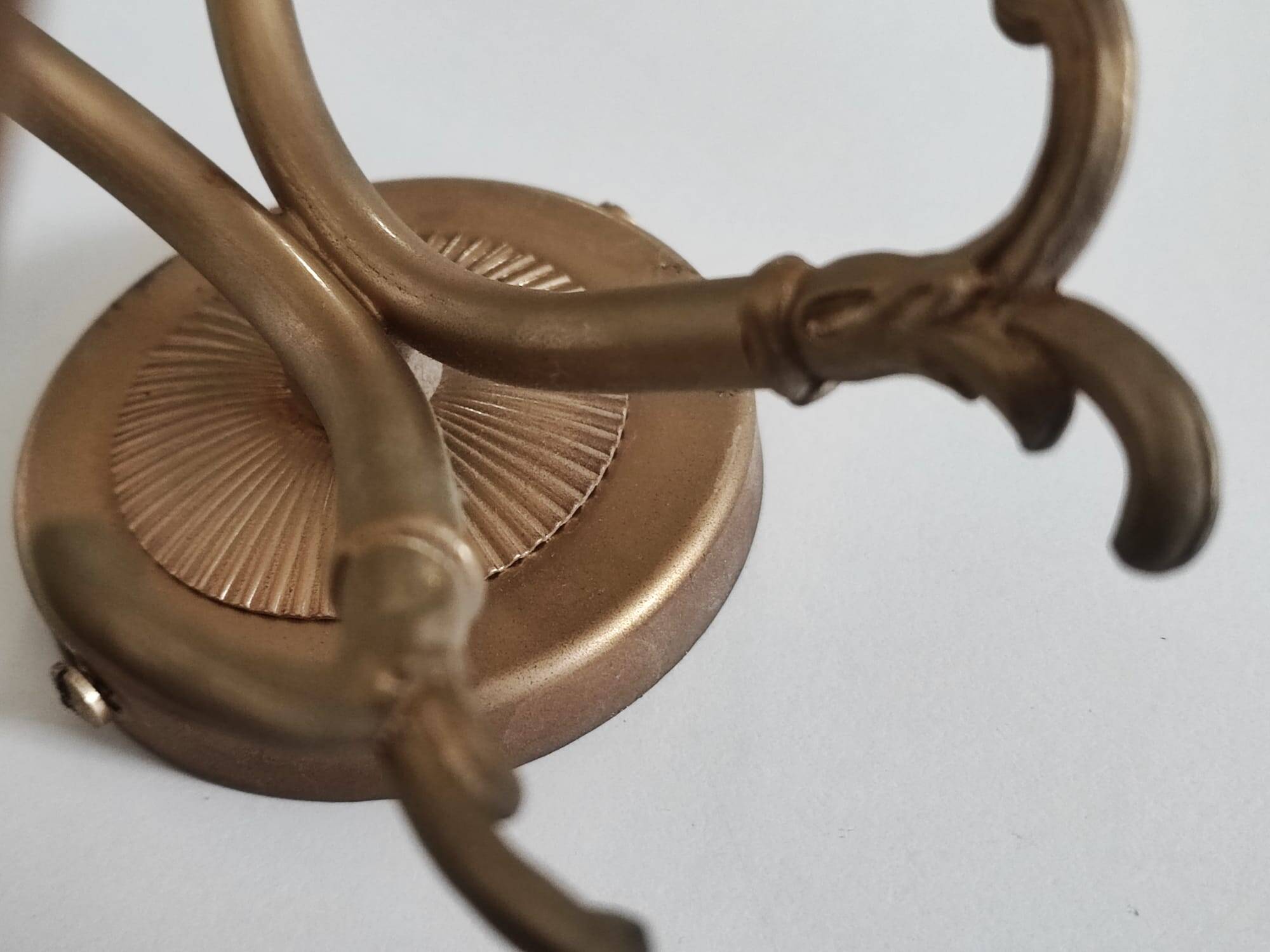 Antique brass wall sconce with two arms, Louis XV style.