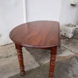 Extendable oval table