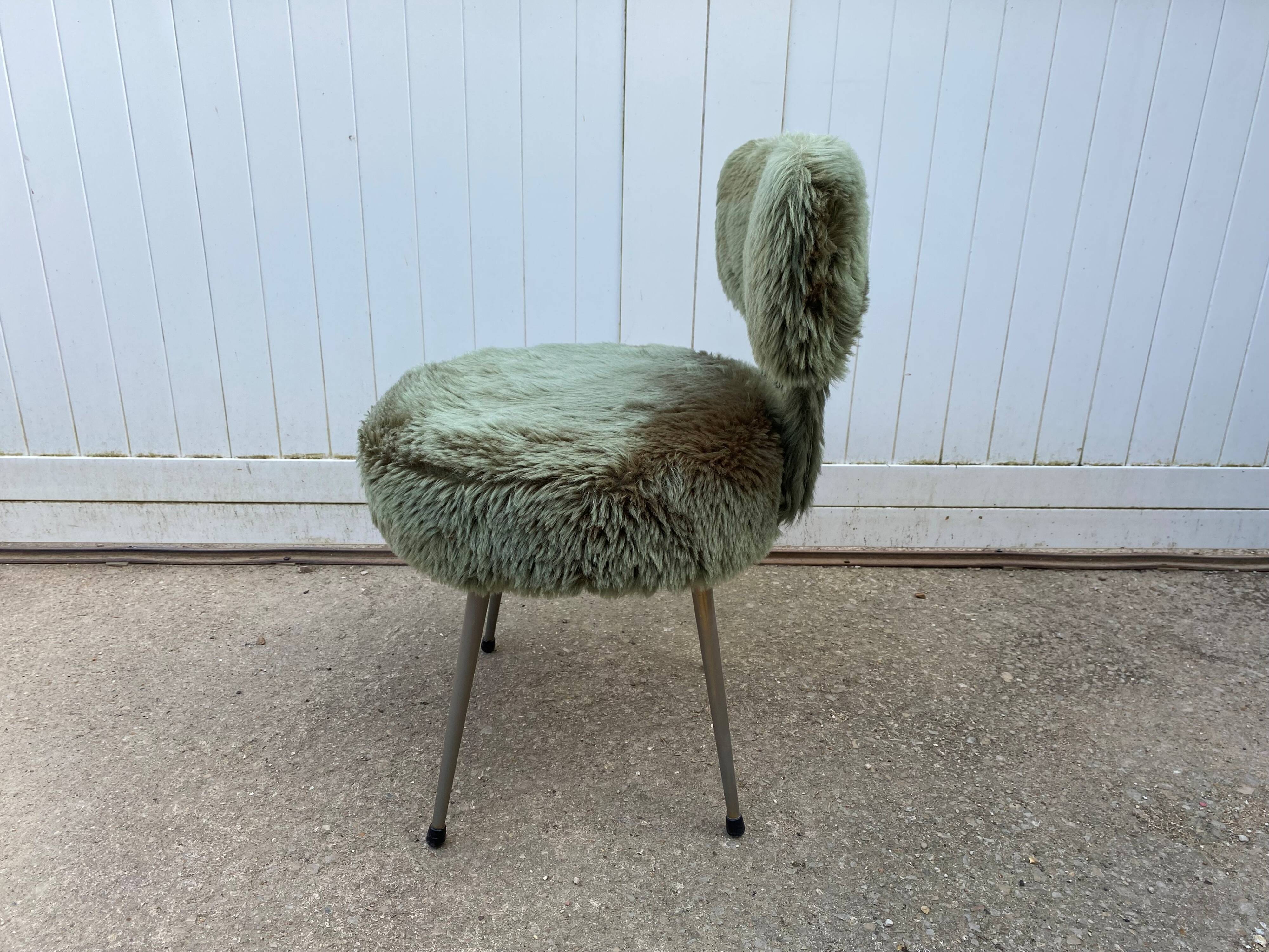 Vintage green furry chair from the 1960s