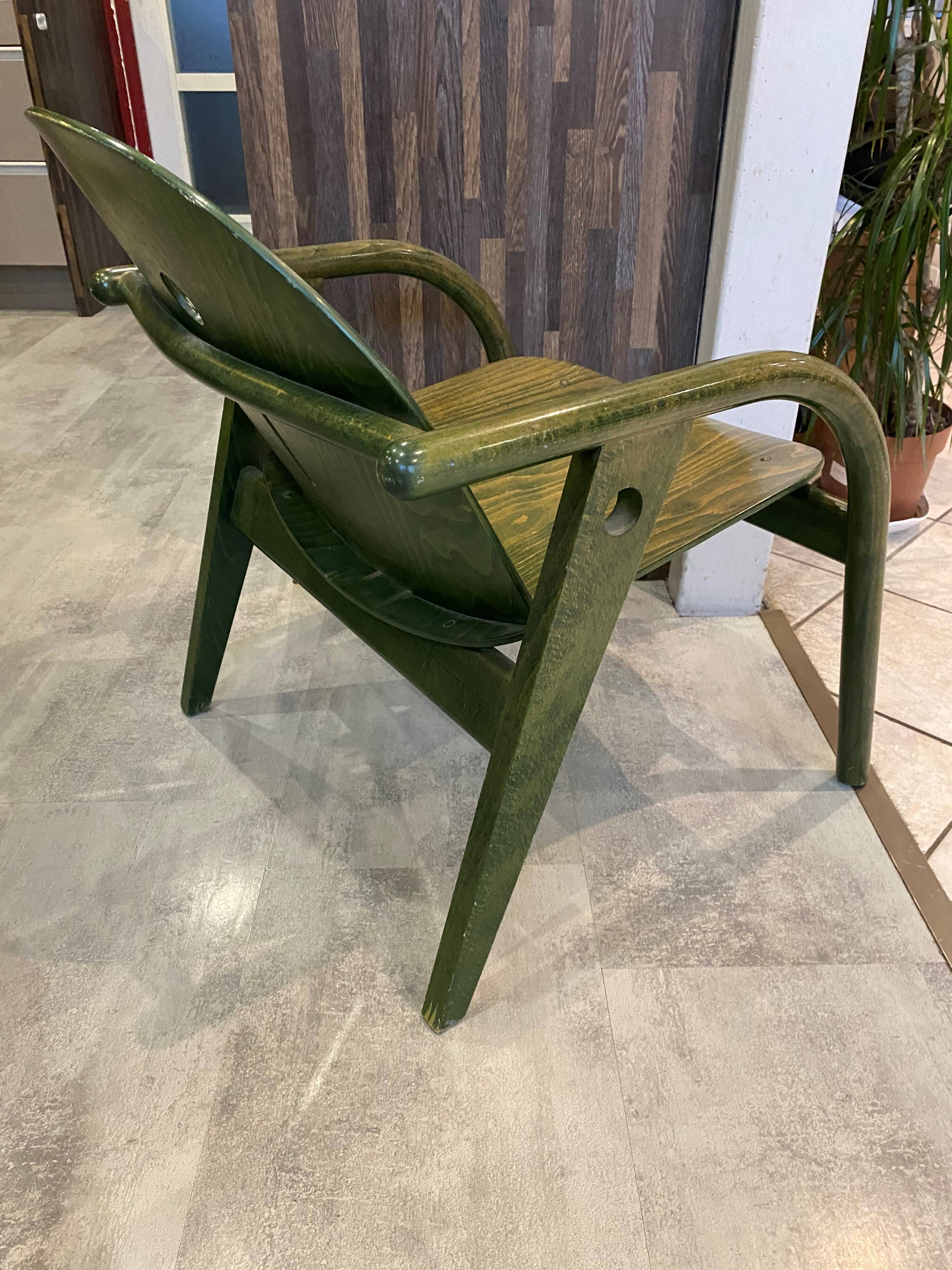 Fauteuil Baumann vert, années 70