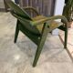 Fauteuil Baumann vert, années 70