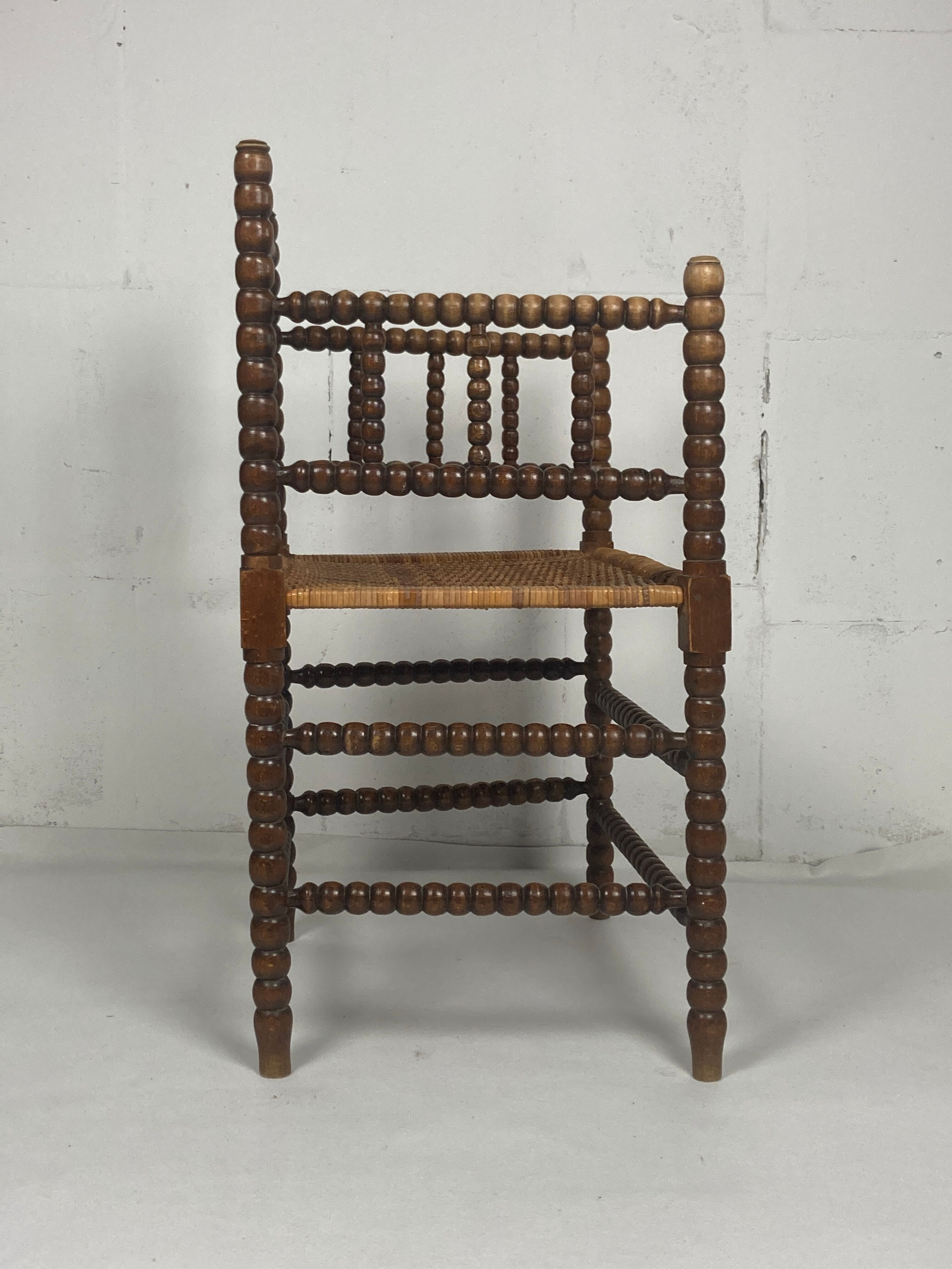 Fauteuil en osier et en bois tourné, années 1930 - 1950