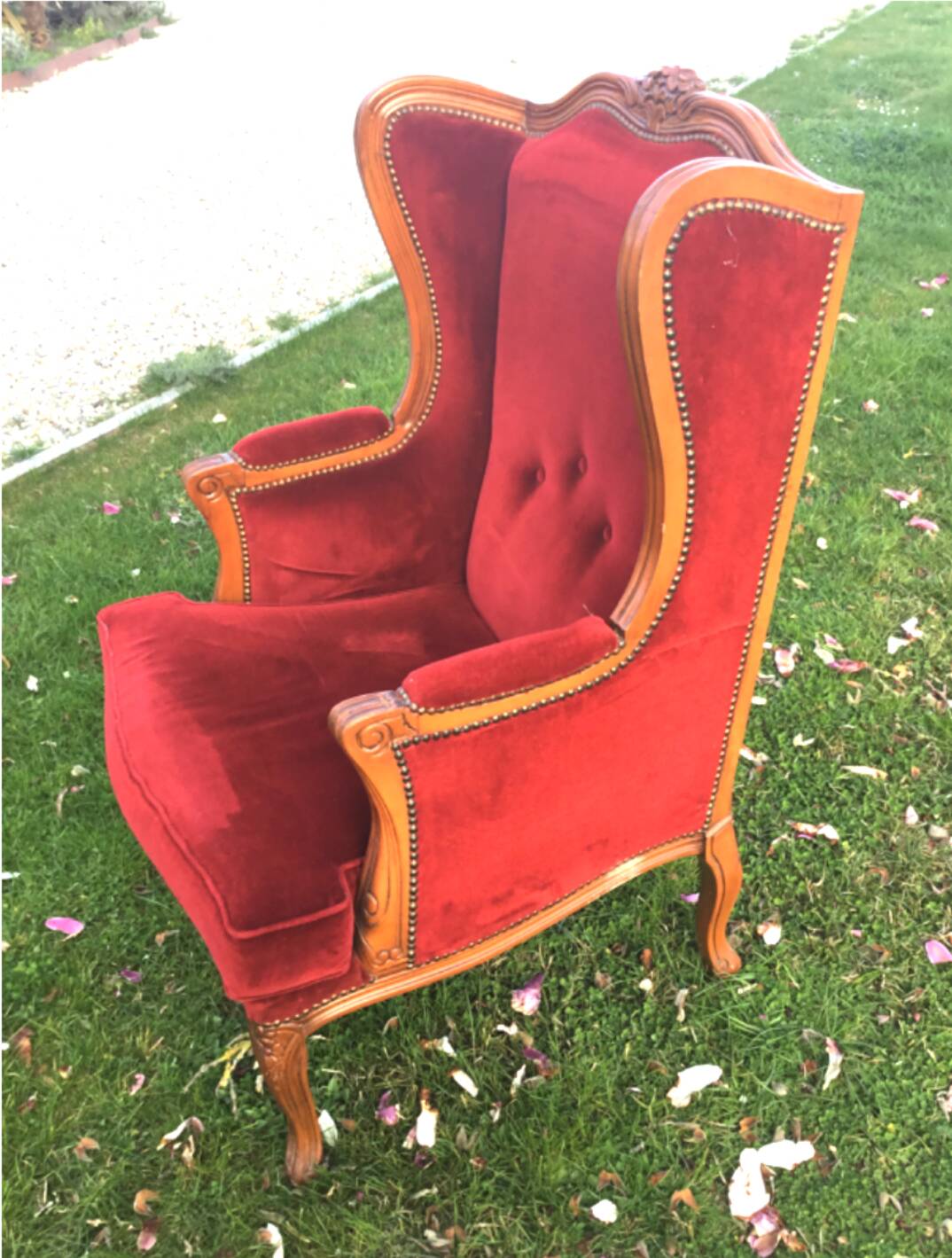 Louis XV style carved wooden shepherdess chair. Red velvet