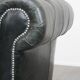 Black cowhide leather chesterfield armchair