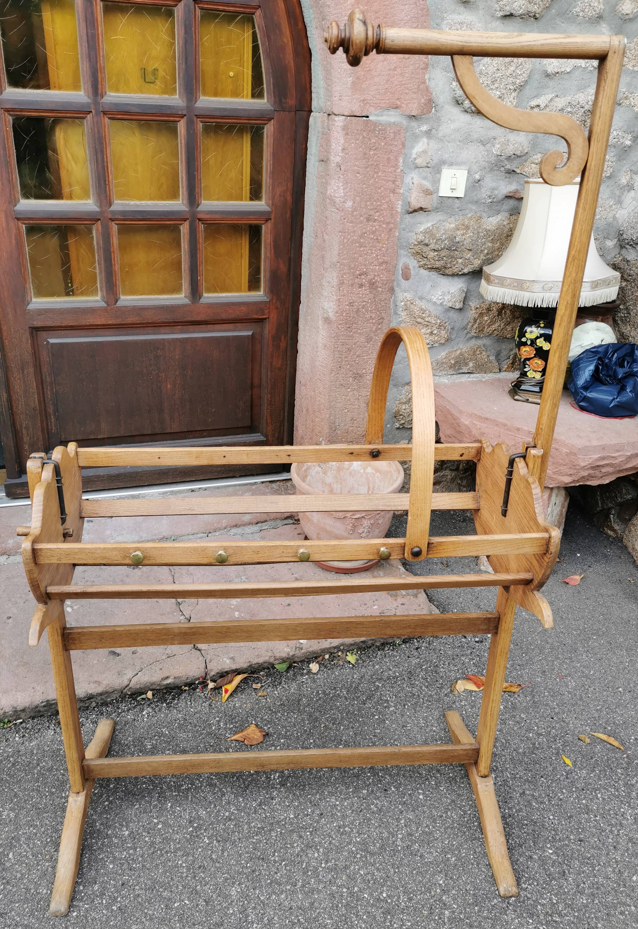 Old cradle with solid oak canopy