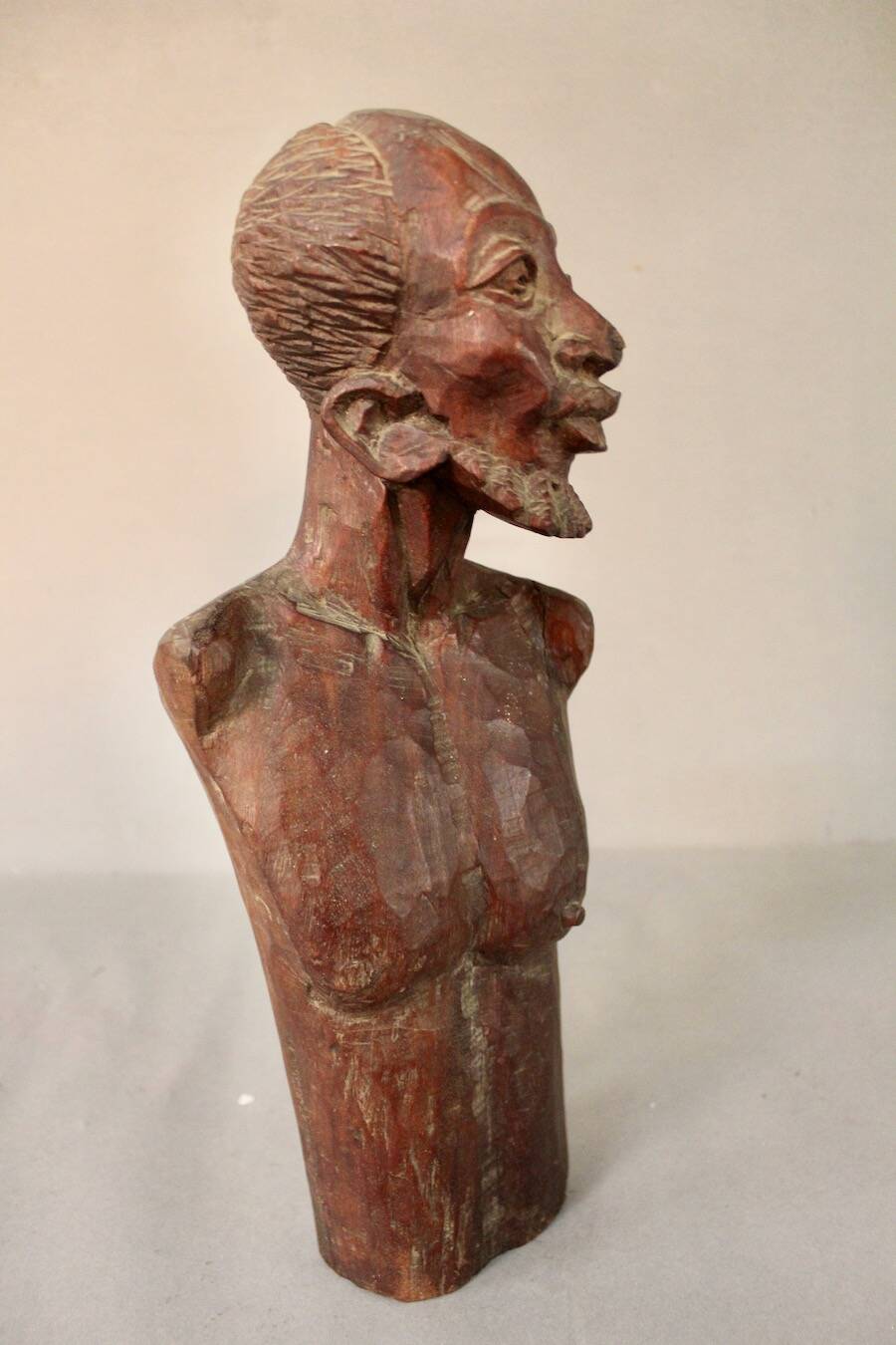 Bust Man in carved wood.