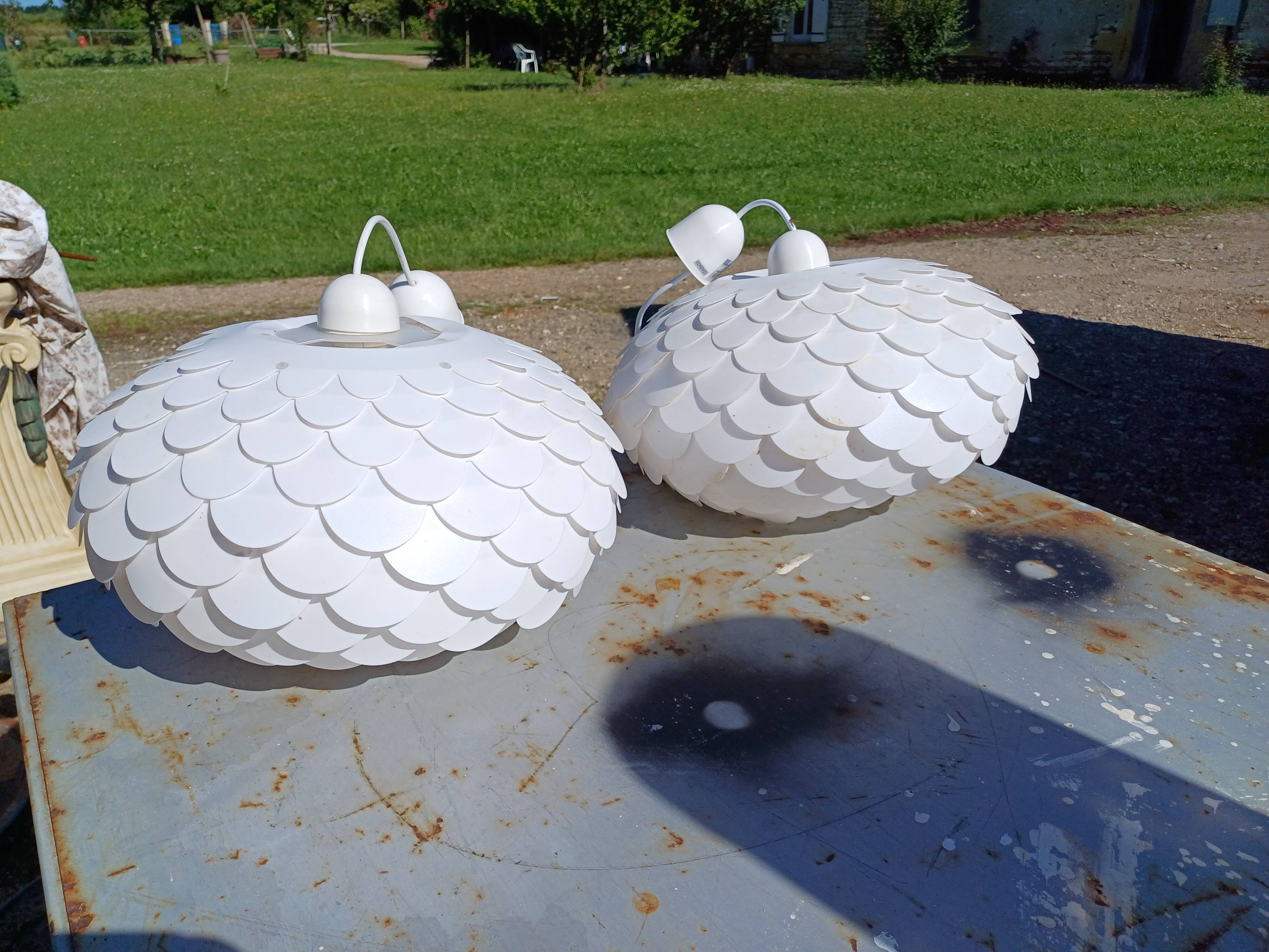 Pair of vintage white plastic pendant lights