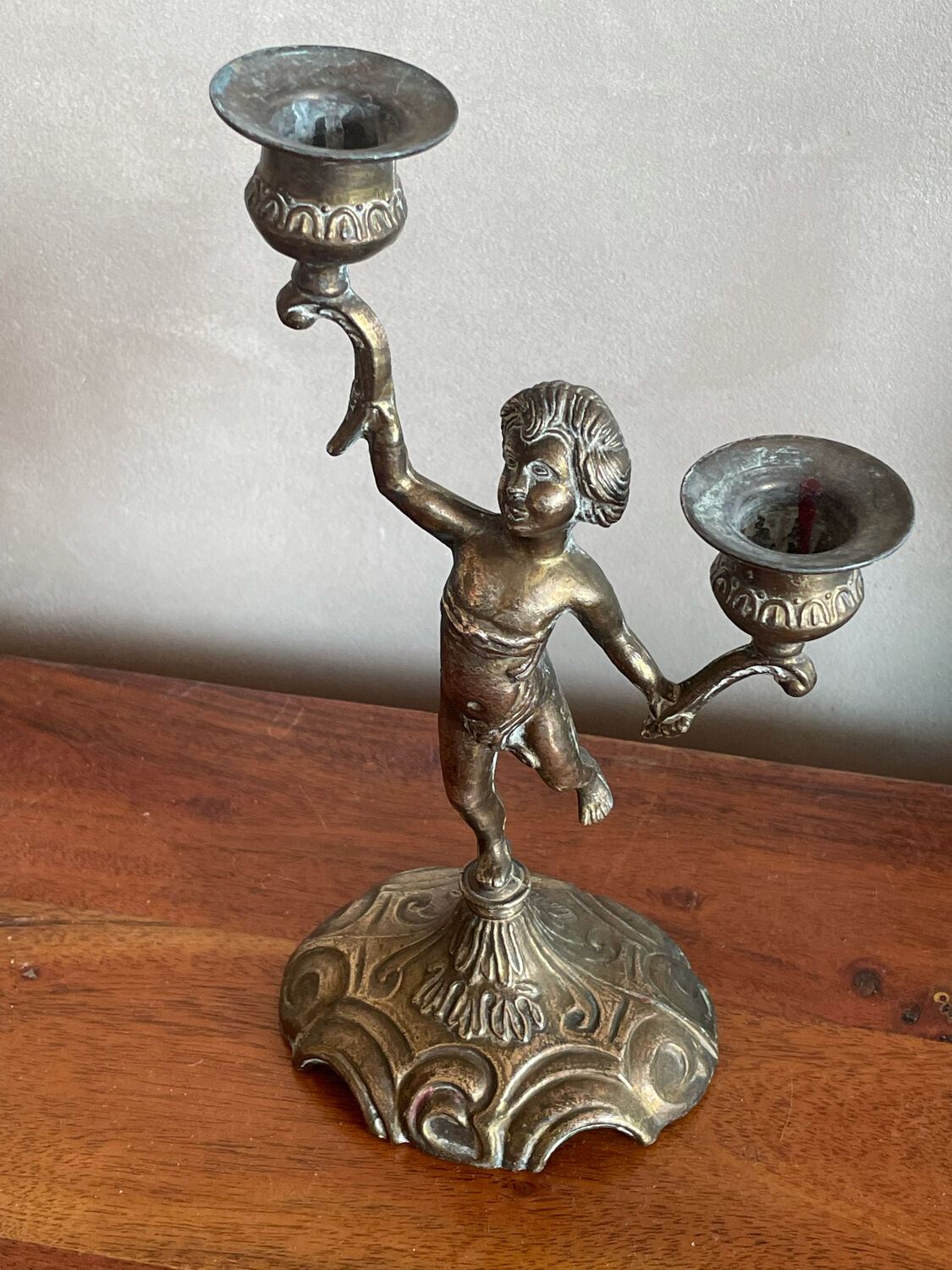 Cherub brass candle holder