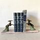 Art deco bookends in pink marble and spelters, antelopes