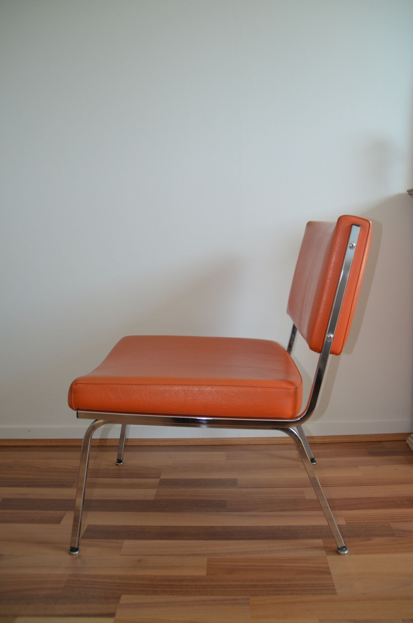 Armchair modernist vintage in orange leatherette 60 years
