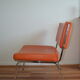 Armchair modernist vintage in orange leatherette 60 years