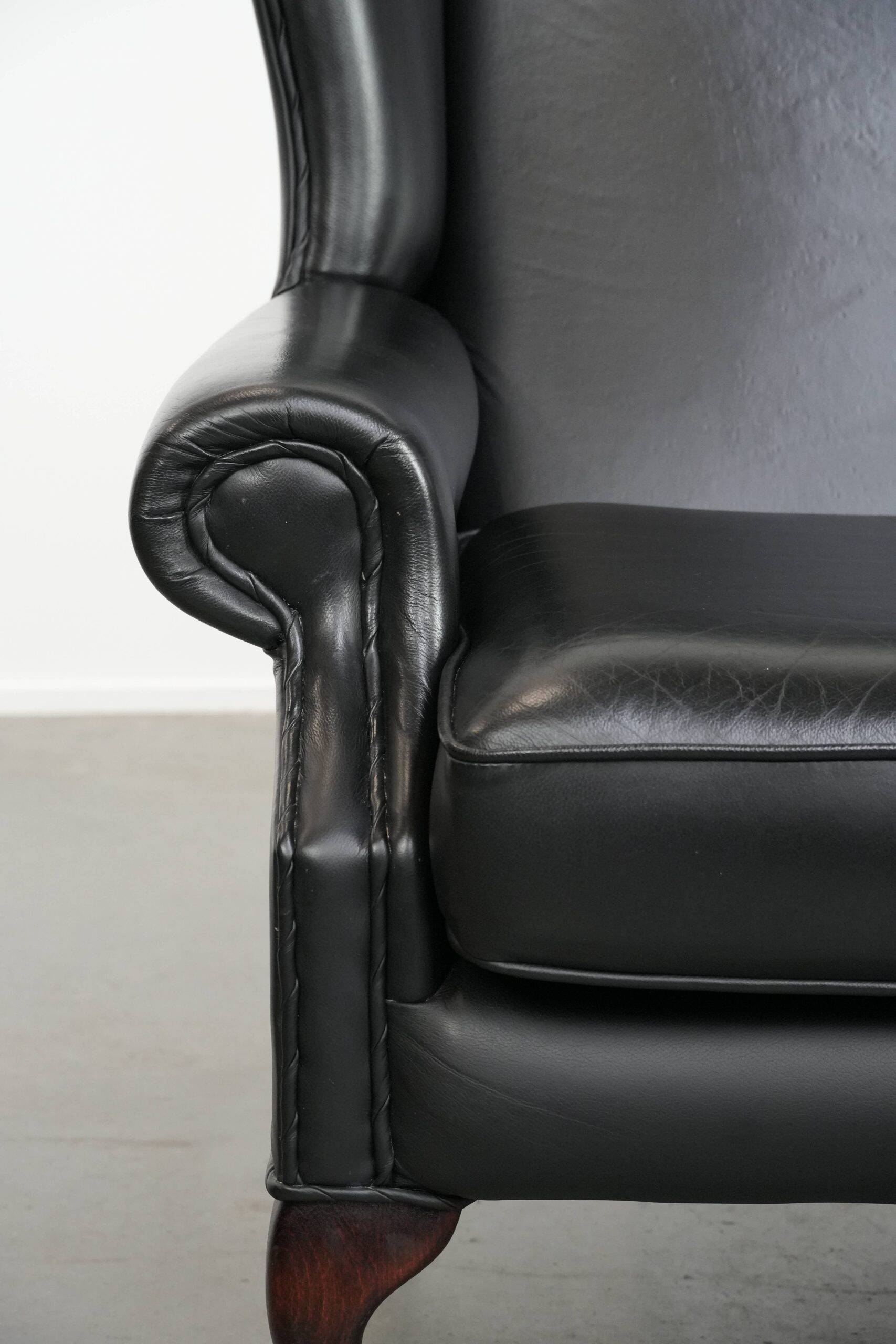 Black cowhide leather Chesterfield wingback chair in English style